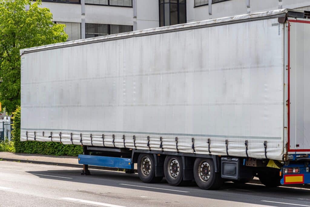 semitrailer-with-white-tarpaulin-without-inscripti-2023-11-27-05-11-17-utc_11zon