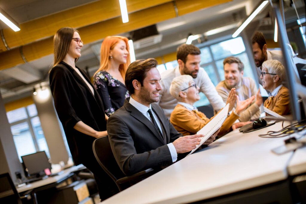 senior-businesswoman-working-together-with-young-b-2023-11-27-05-16-37-utc_11zon