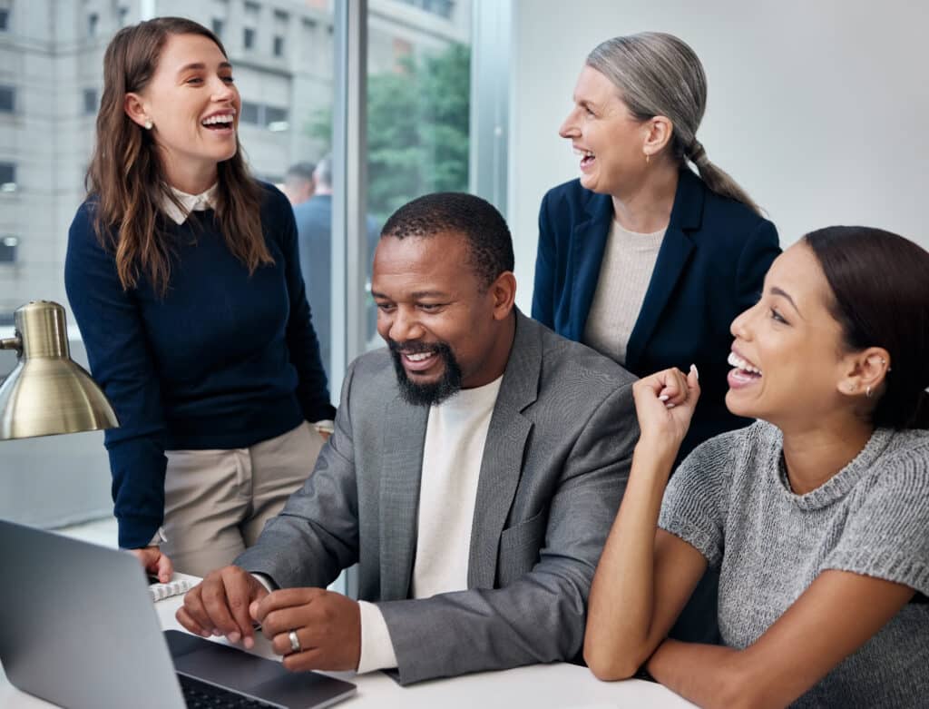 shot of a group of businesspeople using a laptop a 2023 11 27 05 29 02 utc