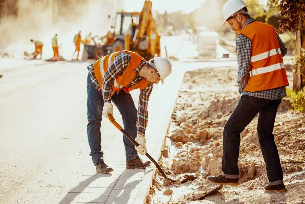 workers-in-reflective-vests-using-shovels-during-c-2024-10-18-08-39-09-utc_11zon