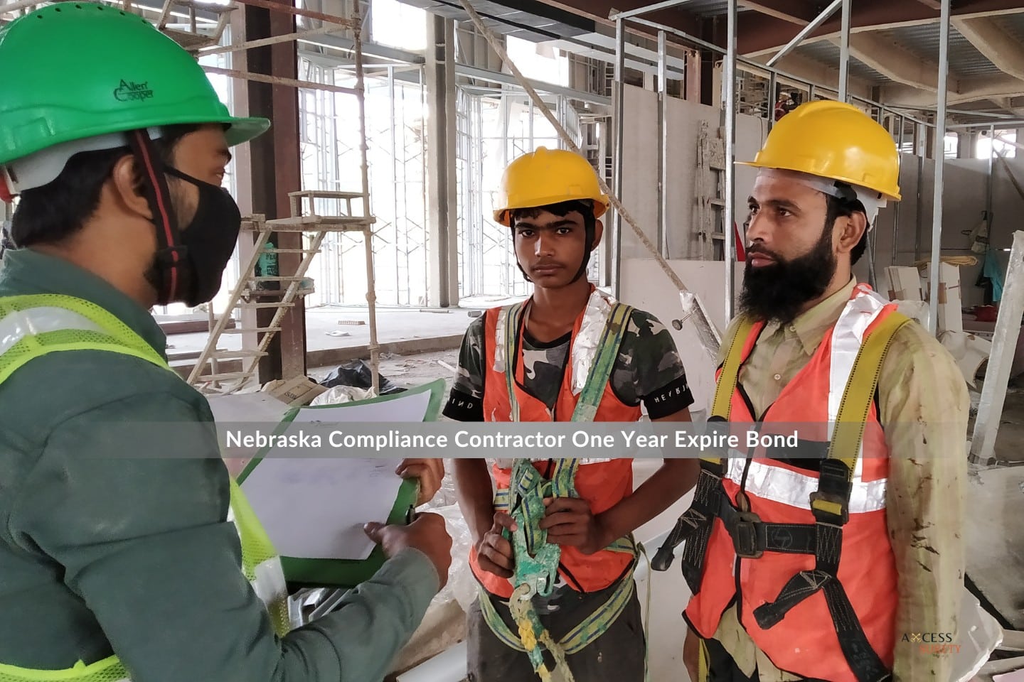 Nebraska Compliance Contractor One Year Expire Bond - An engineer explaining to the two workers 