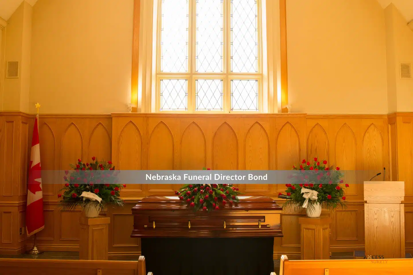Nebraska Funeral Director Bond - Inside a chapel, a coffin with flowers.