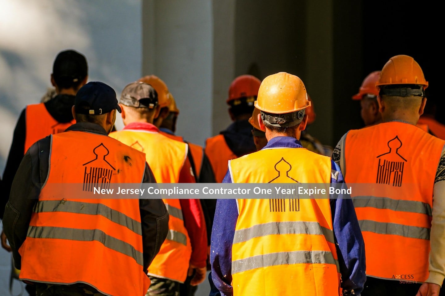 New Jersey Compliance Contractor One Year Expire Bond - Walking construction workers wearing orange vests.