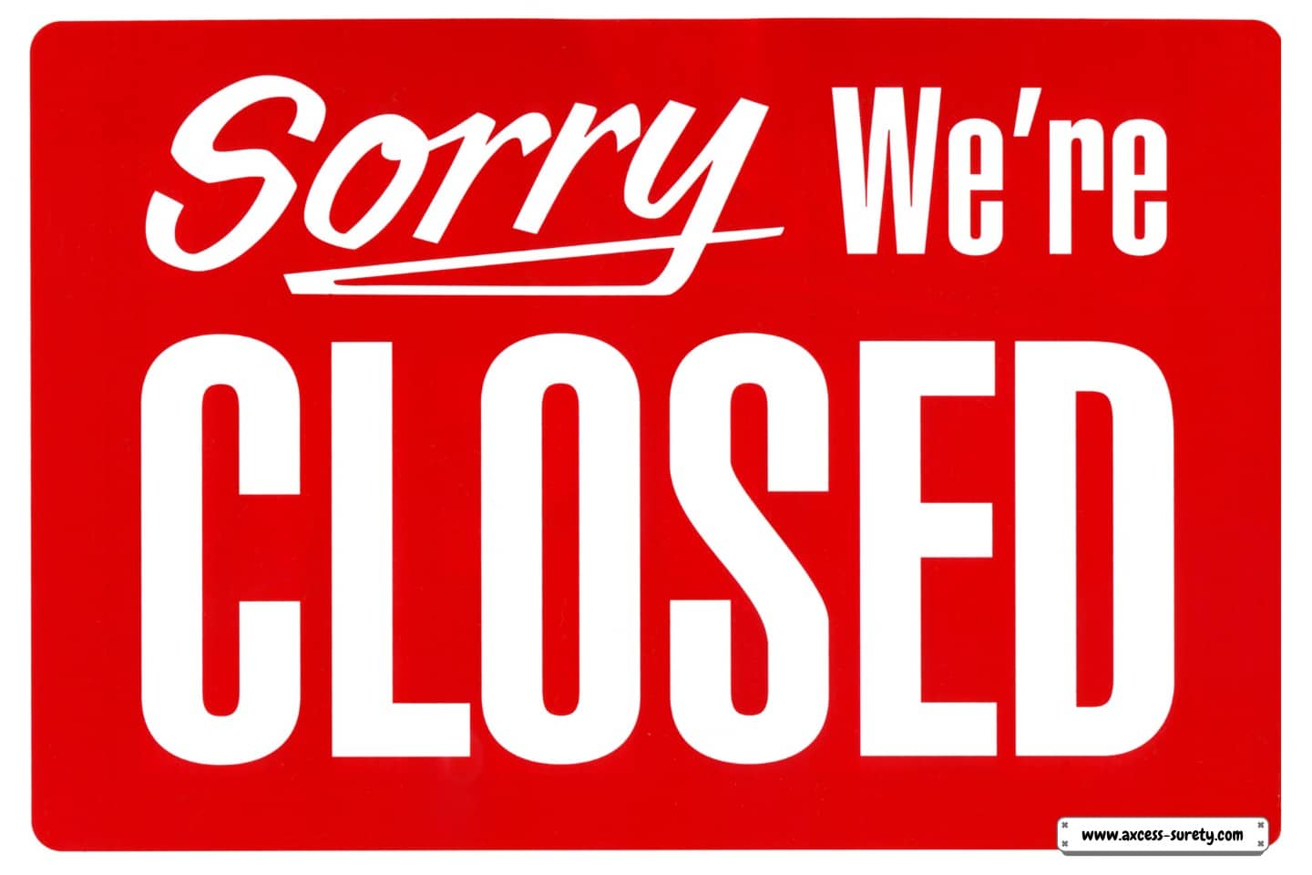 A storefront displays the words "sorry, we're closed."