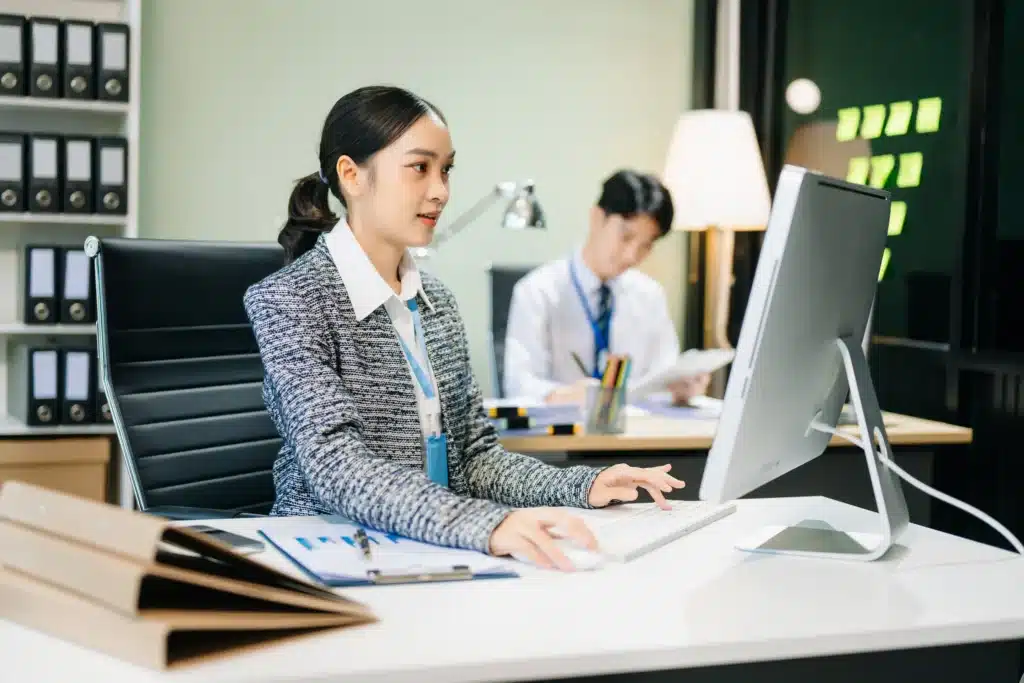 asian-female-office-worker-business-suits-smiling-2024-11-01-21-24-50-utc