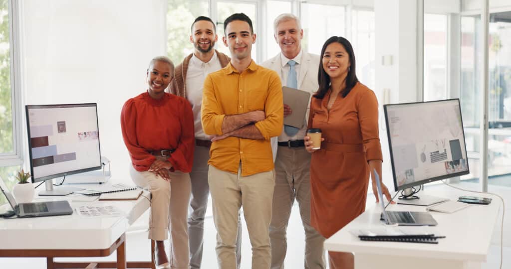 Group, portrait or happy business people in a office with pride, sales revenue goals or growth mind.