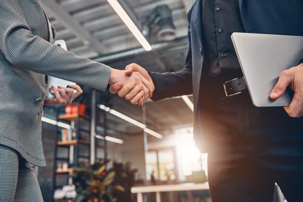 business-partner-shaking-hand-in-the-modern-office-2023-11-27-05-15-39-utc_11zon