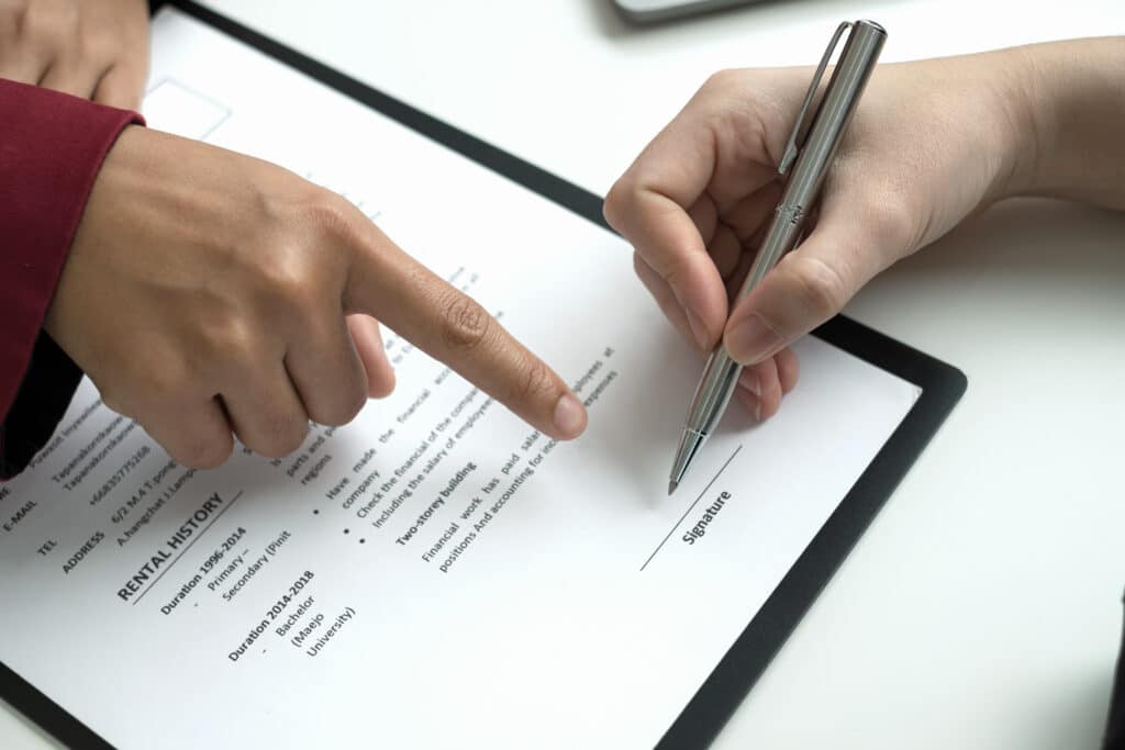 Business people hold a resume and talk to job applicants for job interviews about careers and Their personal history in the company. Recruitment concepts.
