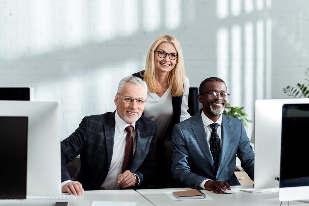 cheerful-blonde-woman-smiling-while-standing-near-2023-11-27-05-34-44-utc_11zon