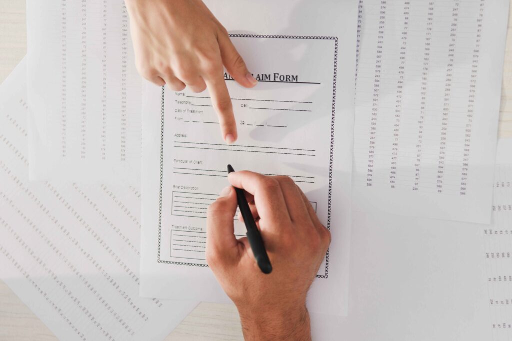 cropped-view-of-client-signing-insurance-claim-for-2024-11-01-06-02-50-utc_11zon