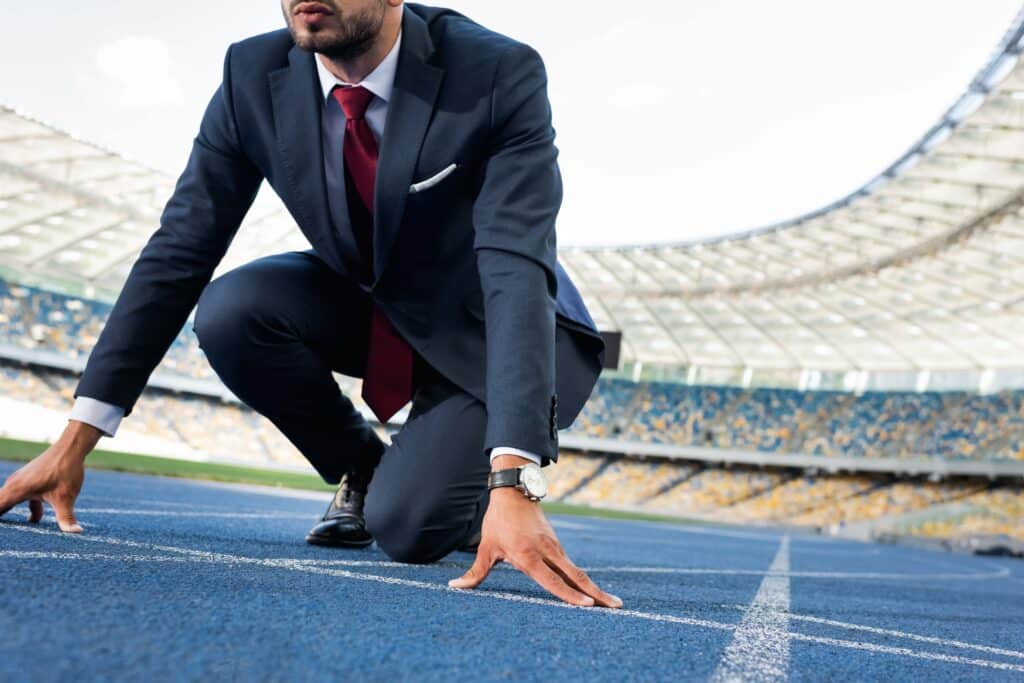 cropped-view-of-young-businessman-in-suit-in-start-2023-11-27-05-14-31-utc_11zon