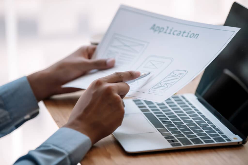 Group of creative designer in mobile application design, analysis and planning development app in the office.