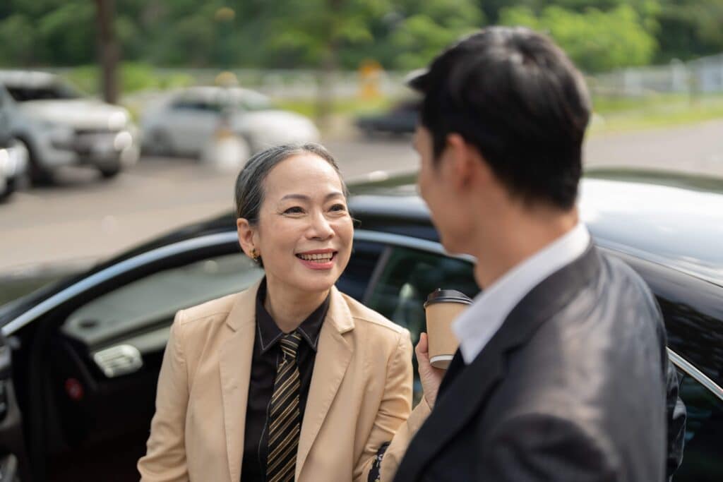 happy-senior-old-asian-businesswoman-discussion-ta-2023-11-27-05-06-53-utc_11zon