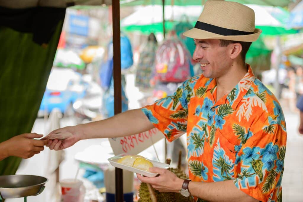 happy-young-handsome-tourist-man-buying-durian-at-2023-11-27-05-31-09-utc_11zon
