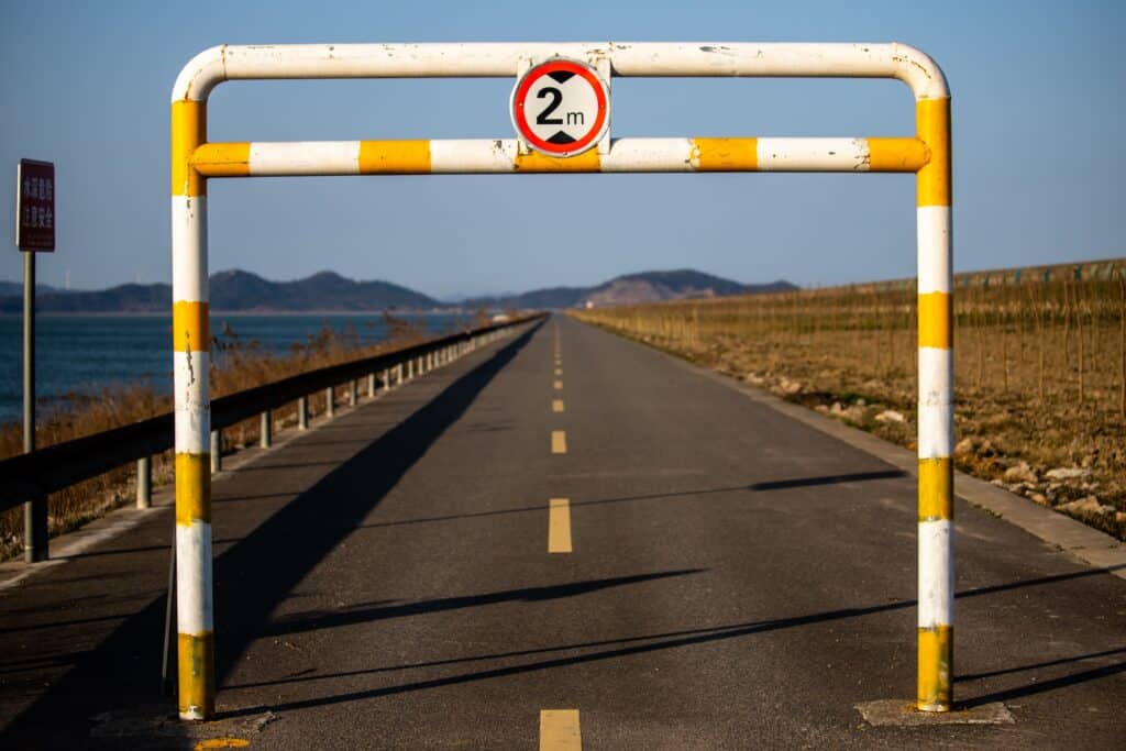A sign in the middle of the road