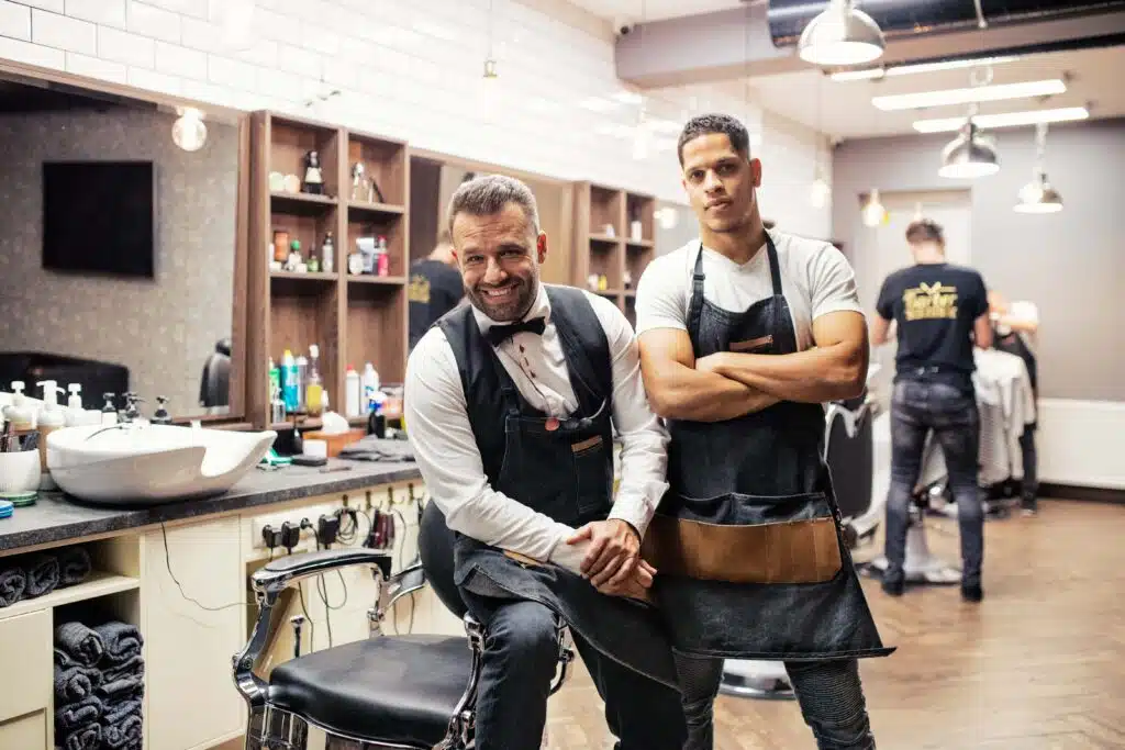 two-male-haidressers-and-hairstylists-sitting-in-b-2024-10-18-11-50-55-utc_11zon