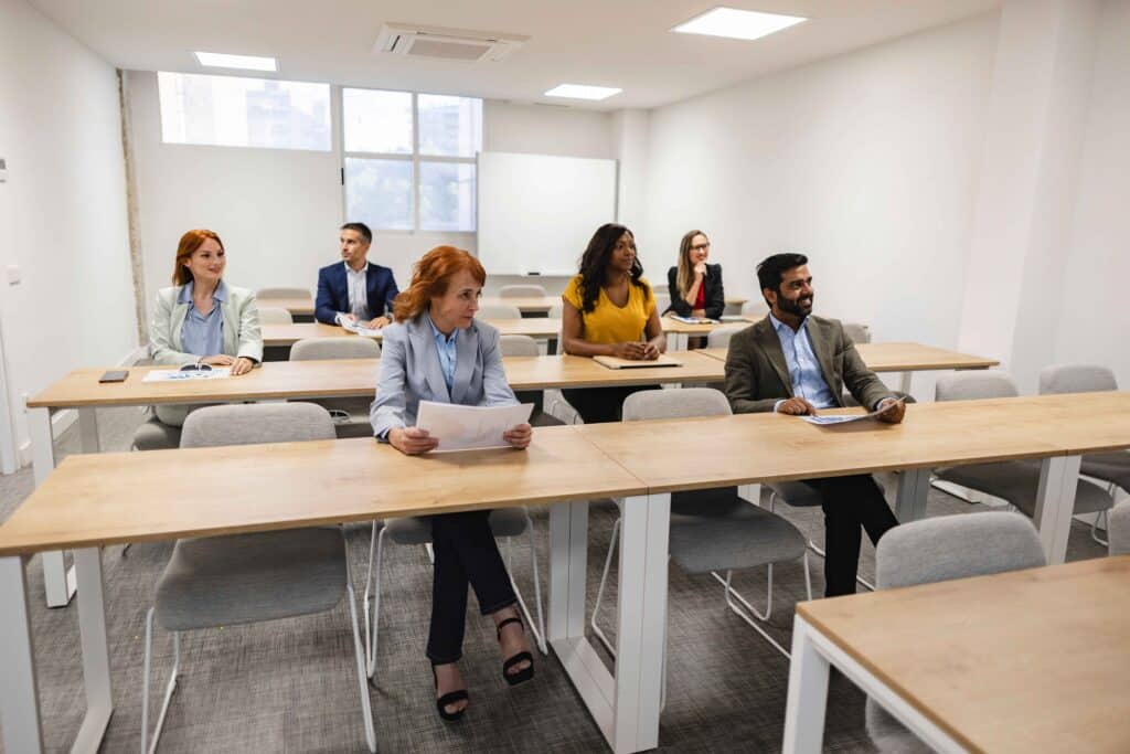 diverse-business-people-sitting-and-listening-duri-2025-02-21-05-32-29-utc_11zon