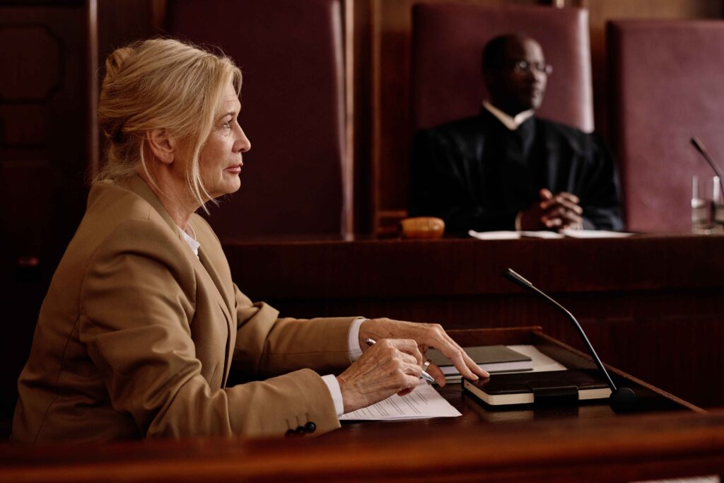 side-view-of-mature-blond-female-witness-or-lawyer-2025-02-11-15-30-56-utc_11zon